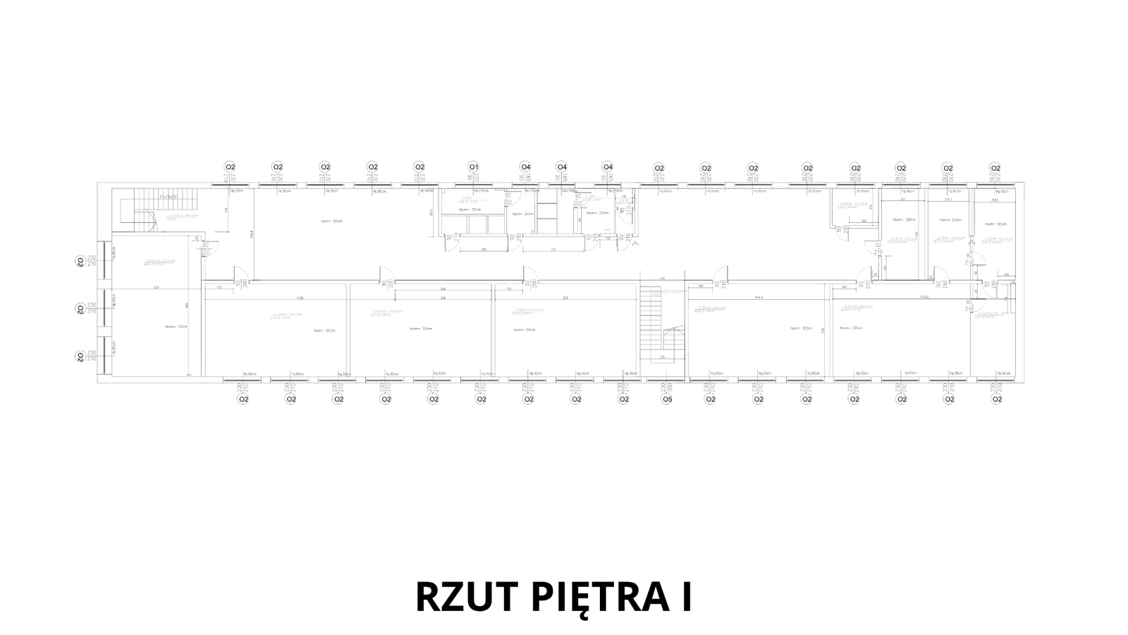 First floor plan — First floor: a repeating layout of classrooms on both sides of the corridor, stair cores at each end and staff facilities in the east wing.